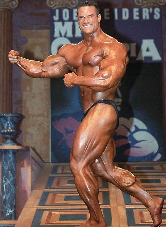 Mike Matarazzo posing at the Mr.Olympia