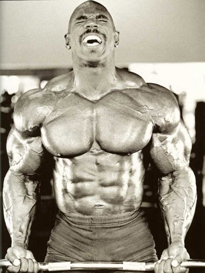 Flex Wheeler Barbell Curls